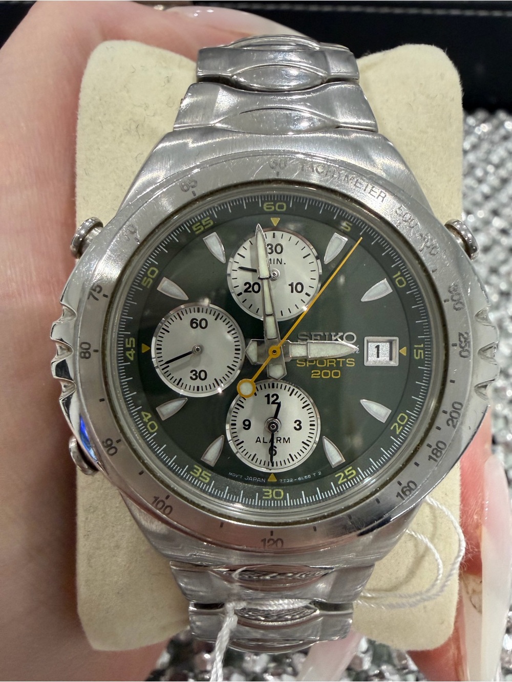 Seiko Silver Stainless Steel Watch with Green Dial and Yellow Accents